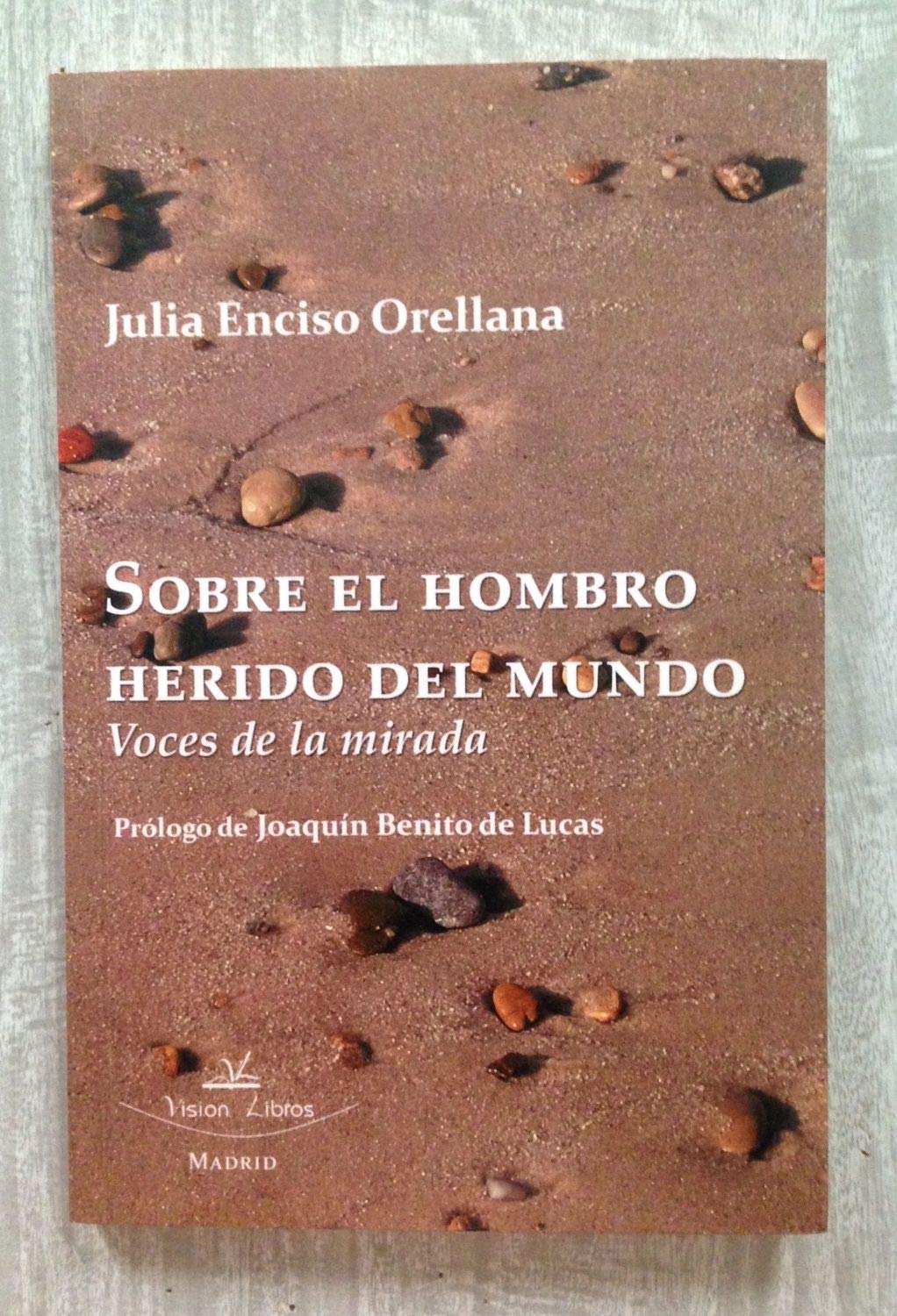 Sobre el hombro herido del mundo