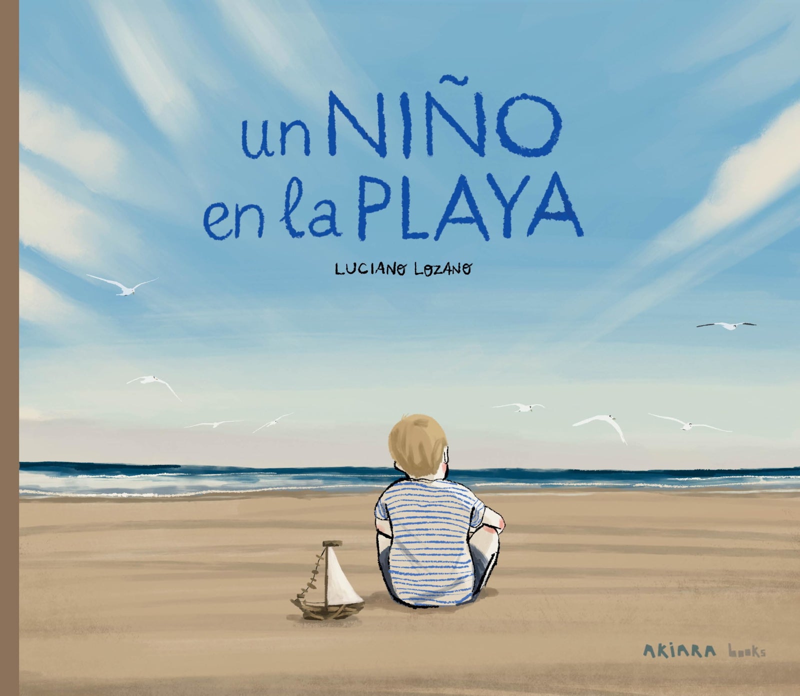 Un niño en la playa: 28 (Akialbum)