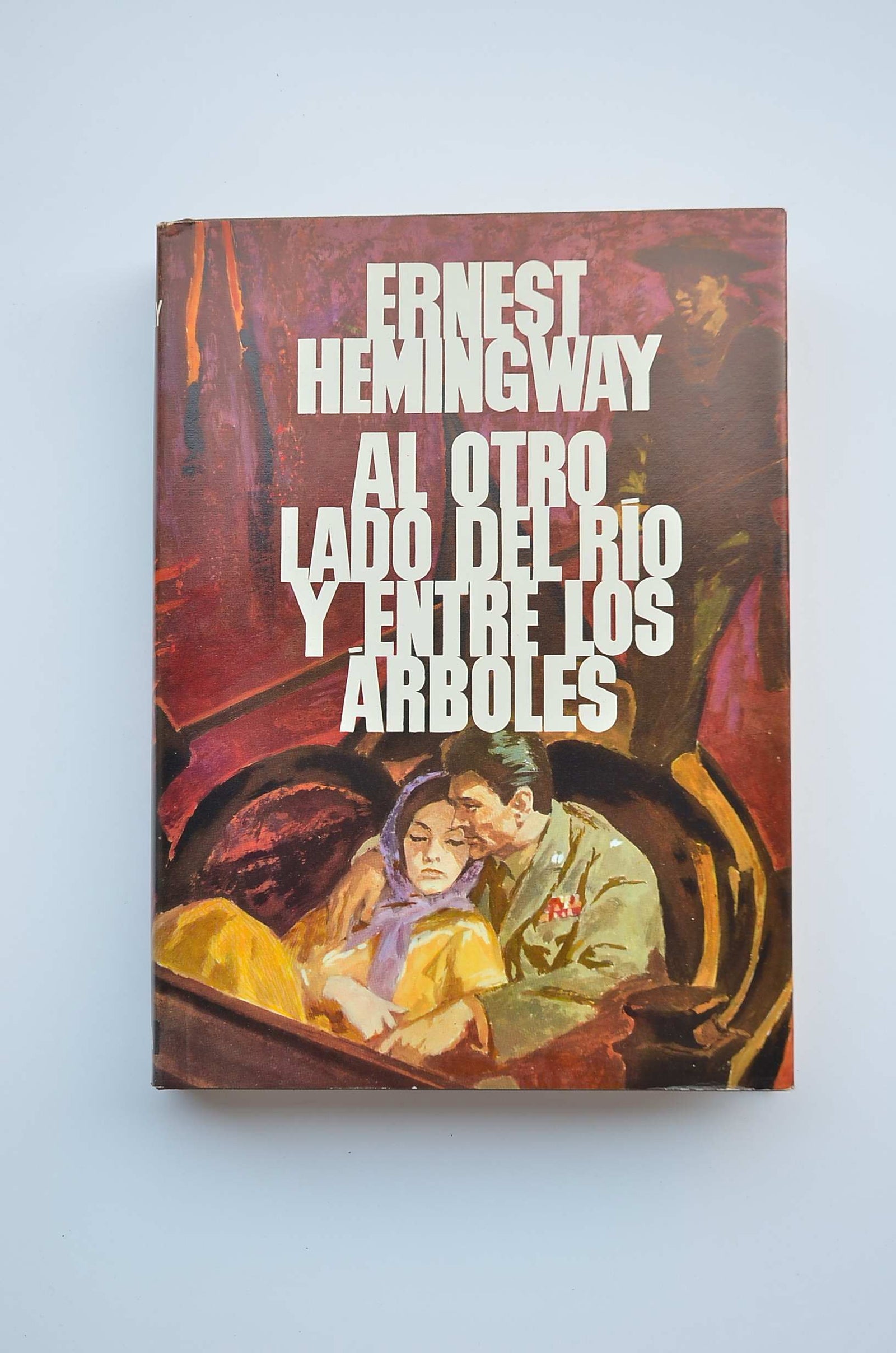 Al otro lado del río ; y Entre los árboles : novela / Ernest Hemingway